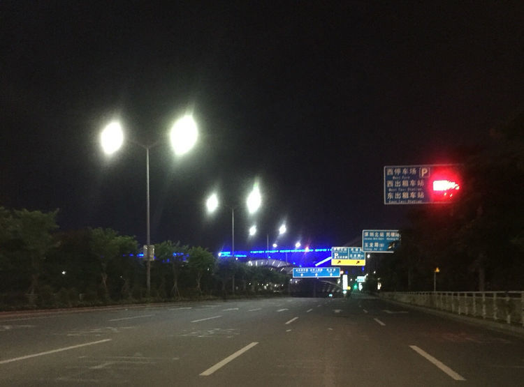 LED street lights illuminate the night sky of the city