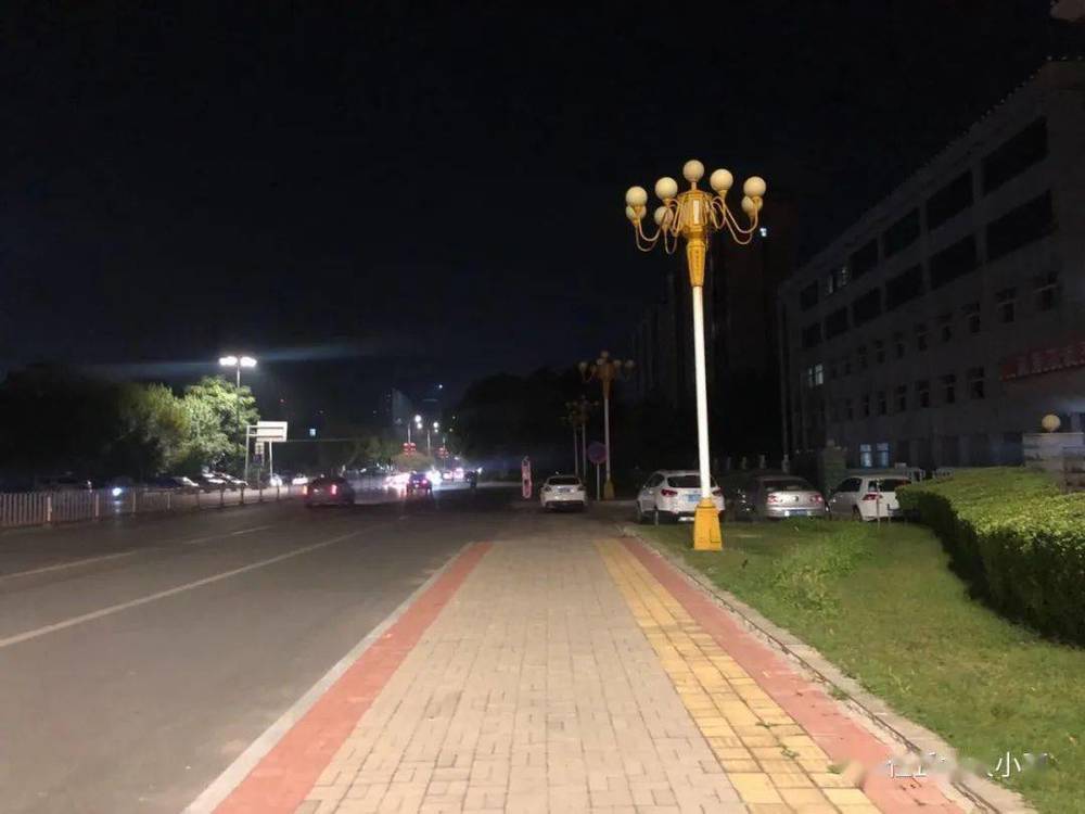 LED street lights illuminate the road at night